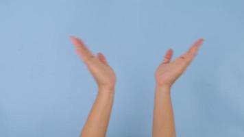 Female hands clapping, celebrating, congratulating and applauding gestures isolated on pastel blue background in studio. Pack of Gestures movements and body language. video