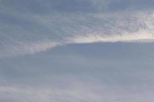 Clear blue sky and white clouds photo