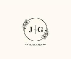 initial JG letters hand drawn feminine and floral botanical logo suitable for spa salon skin hair beauty boutique and cosmetic company. vector