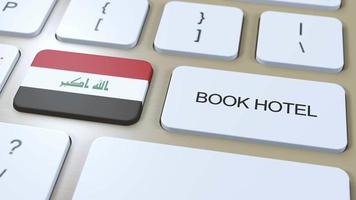 livre Hôtel dans Irak avec site Internet en ligne. bouton sur ordinateur clavier. Voyage concept 3d animation. livre Hôtel texte et nationale drapeau