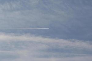 Clear blue sky and white clouds photo