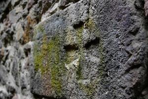 Ancient Cross carved in stone photo