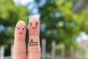 Fingers art of Happy couple. Man likes women's long eyelashes . photo