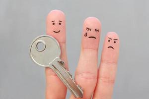 Fingers art of family during quarrel. Concept of man and woman cannot divide property after divorce. photo