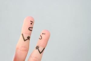 Fingers art of couple during quarrel. photo