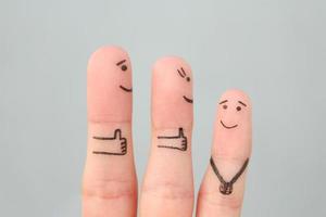 Fingers art of happy family. Concept parents are proud of their child. photo