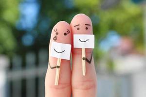 Fingers art of couple. Concept of people hiding emotions. photo