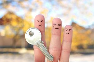 Fingers art of family during quarrel. Concept of man and woman cannot divide property after divorce. photo