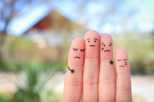 Fingers art of displeased family. Concept of solution to the problems of family, support in difficult situations. photo