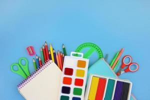 Stationery objects. School supplie. Top view. photo