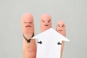 dedos Arte de familia durante disputa. concepto de hombre y mujer dividir casa después divorcio. foto