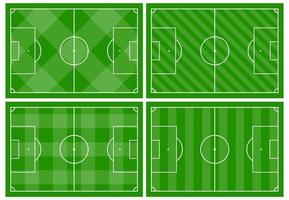 Set of four football fields with different green grass ornaments. Soccer field for playing. Vector illustration