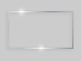 Shiny frame with glowing effects. Silver rectangular frame with shadow on grey background. Vector illustration