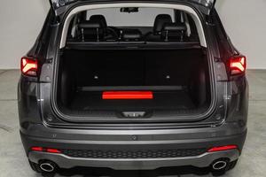 Clean, open empty trunk in the gray  car SUV photo