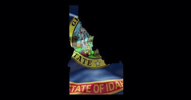 Idaho state map with waving flag. Alpha channel background video