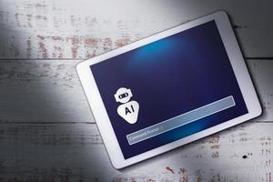 Top view of digital tablet with chatbot on screen and copy space. Command prompt AI concept. Artificial Intelligence. Futuristic technology transformation. photo