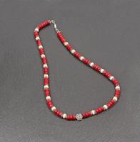 Pendant necklace bracelet gemstone on white background colored photo