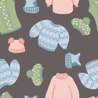 Seamless pattern with knitted warm clothes, sweaters and hats on dark background vector