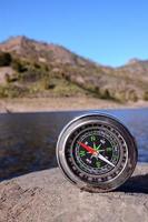 Compass on the rock photo