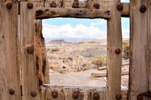 Abandoned structures in the desert photo