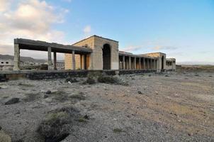 Abandoned structures in the desert photo