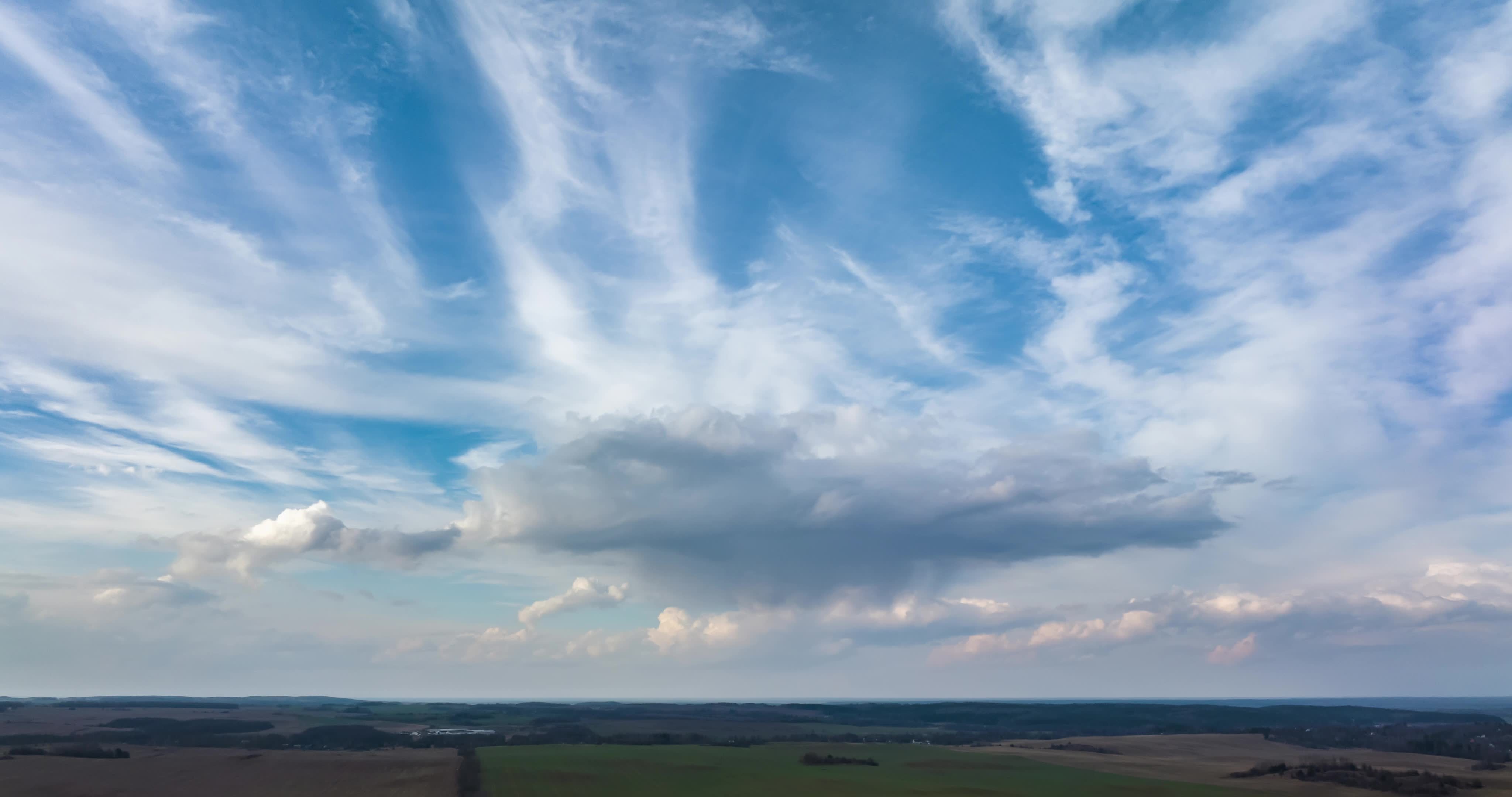 timelapse of blue sky background with many layers striped clouds 21752994 Stock Video at Vecteezy