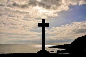 Large cross on the coast photo