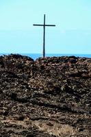 Large cross on the coast photo