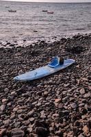 Blue paddle board photo