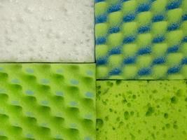Close-up of the texture of the Dish Washing Sponge. Home cleaning concept. sponge for dishes