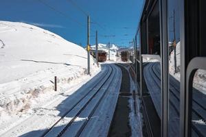 The train of Gonergratbahn running to the Gornergrat station and Stellarium Observatory - famous touristic place with clear view to Matterhorn. Glacier Express train. photo