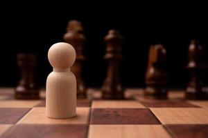 New business leader confrontation with king chess is a challenge for new business player, strategy and vision is key success. Concept of competition and leadership photo