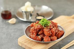 Sweet and Soy Spicy Yangnyeom Popcorn Chicken. photo