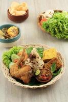 Nasi Tutug Oncom. Traditional Sundanese Meal of Rice Mixed with Fermented Soybean photo