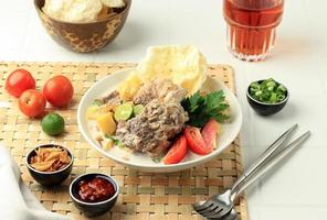 Soto Betawi Iga, Traditional Beef Ribs Soup from Betawi, Jakarta. photo