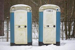 Ecological mobile toilets are in the park. Public portable bio wc toilets in park photo