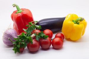 Fresh vegetables on white background photo
