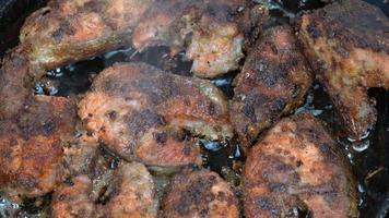 Close-up view of frying red Salmon fish in flour in cooking pan with oil. Grilled Pacific Sockeye Salmon - traditional Asian cuisine, great gourmet food for any garnish. video