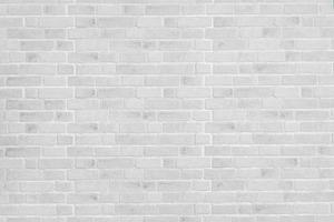 Abstract white brick wall texture background. White brick wall architecture in rural room photo