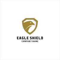 Eagle and shield logo design. Bird, falcon or hawk head badge emblem vector icon