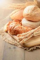 Homemade bread sticks, croissant and bread photo