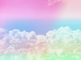 beauty sweet pastel green pink   colorful with fluffy clouds on sky. multi color rainbow image. abstract fantasy growing light photo