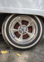 The beautiful vintage rims on a wheel in silver color photo