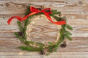 Christmas greeting banner on wooden backround, flat lay photo