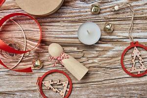 Christmas decorations on wooden background, Flat lay photo