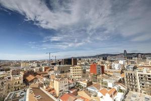 Barcelona, spain skyline on a beautiful day from a unique high vantage point photo