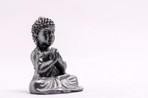 Silver Buddha statue photo