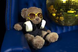 teddy bear in a disco setting photo