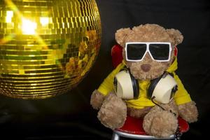 teddy bear in a disco setting photo