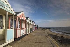 beach huts in southwold, england photo